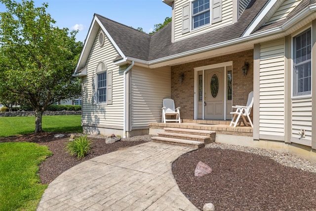 16 Hidden View Dr, Newburgh, NY 12550 - property entrance featuring roof with shingles and covered porch