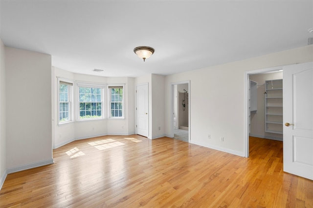 16 Hidden View Dr, Newburgh, NY 12550 - unfurnished room with light wood-style floors and baseboards