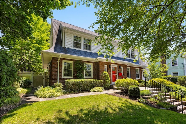 225 Fisher Ave, White Plains, NY 10606 - view of front of house with brick siding and a shingled roof