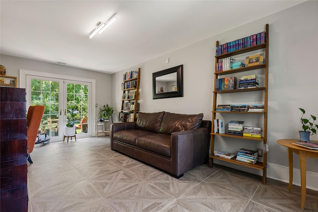 225 Fisher Ave, White Plains, NY 10606 - living area with french doors and baseboards