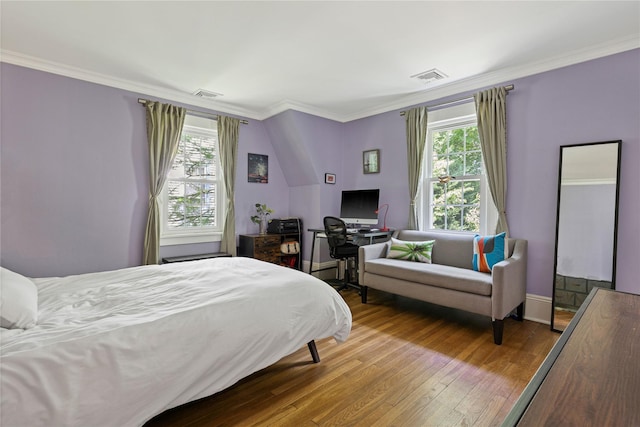 225 Fisher Ave, White Plains, NY 10606 - bedroom featuring wood finished floors, ornamental molding, and an office area