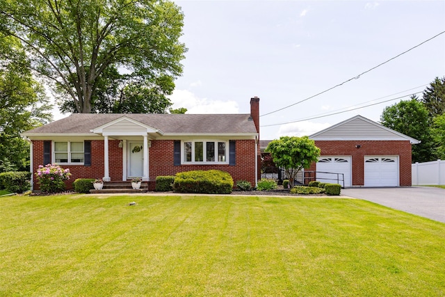 18 Lorraine Blvd, Poughkeepsie, NY 12603 - single story home with brick siding, a chimney, and a garage