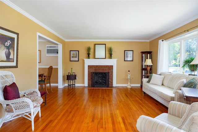 18 Lorraine Blvd, Poughkeepsie, NY 12603 - living room with light wood finished floors, crown molding, a fireplace, baseboards, and a wall mounted AC