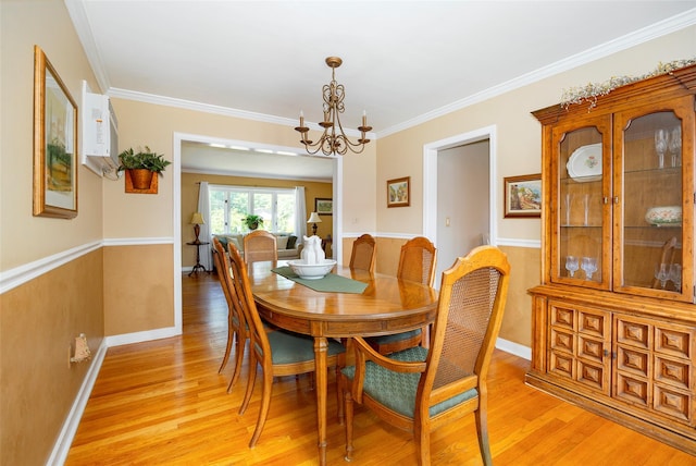 18 Lorraine Blvd, Poughkeepsie, NY 12603 - dining room featuring a chandelier, light wood-style flooring, ornamental molding, and baseboards