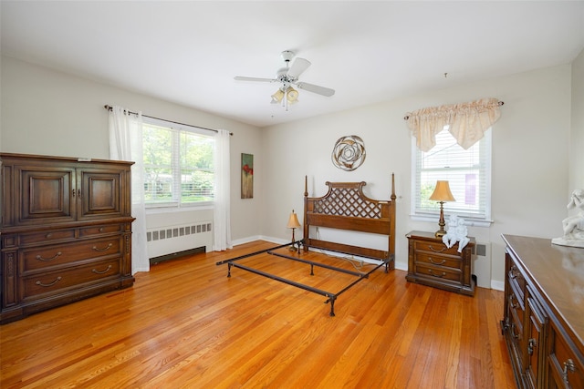 18 Lorraine Blvd, Poughkeepsie, NY 12603 - bedroom with radiator heating unit, light wood-style flooring, and baseboards