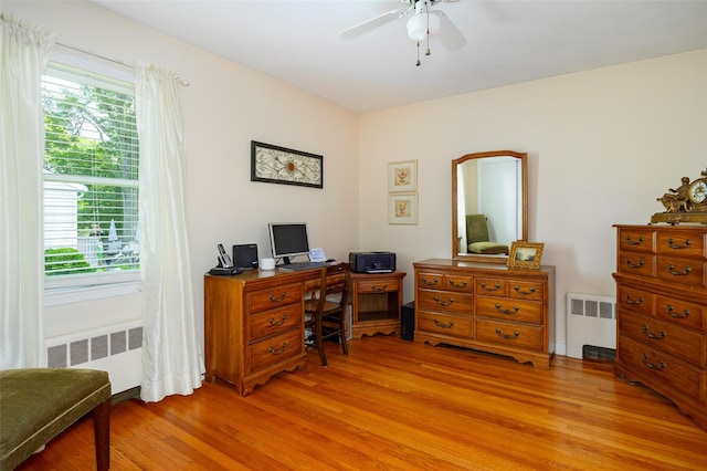 18 Lorraine Blvd, Poughkeepsie, NY 12603 - office area with radiator, light wood-style floors, and ceiling fan