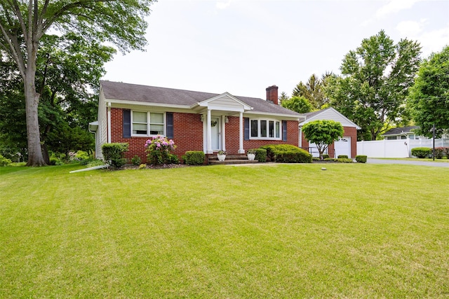 18 Lorraine Blvd, Poughkeepsie, NY 12603 - view of front of property featuring a chimney, brick siding, an attached garage, and roof with shingles