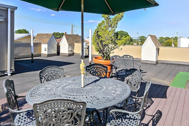 150-31 12th Ave Unit 112, Whitestone, NY 11357 - wooden deck with outdoor dining space