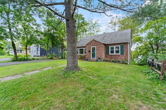 5 Fairview Ave, New Paltz, NY 12561 - view of front of property featuring brick siding and roof with shingles