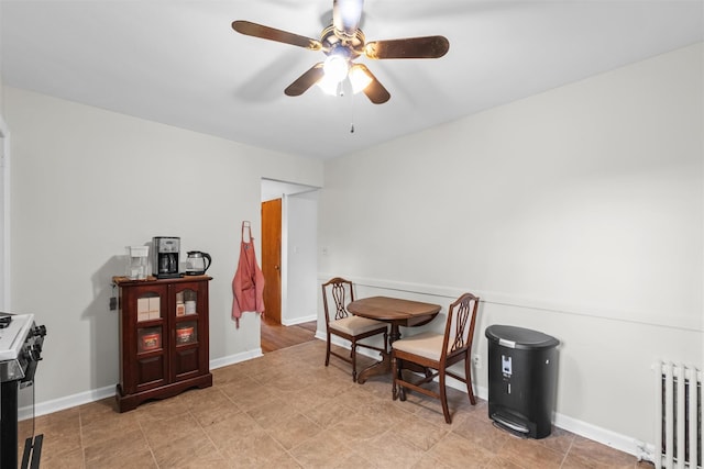 5 Fairview Ave, New Paltz, NY 12561 - living area with radiator, ceiling fan, and baseboards