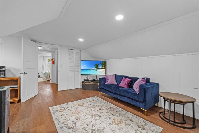 5 Fairview Ave, New Paltz, NY 12561 - living room featuring wood finished floors, vaulted ceiling, and recessed lighting