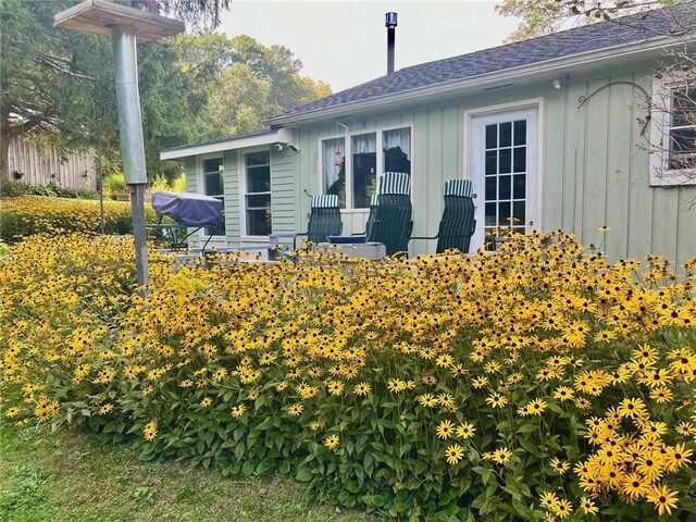 184 Sawchuck Rd, Millerton, NY 12546 - view of side of home featuring board and batten siding and a shingled roof