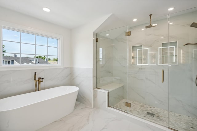 7 Eton Pl, Plainview, NY 11803 - bathroom with a marble finish shower, recessed lighting, a freestanding bath, marble tiled floors, and a wainscoted wall