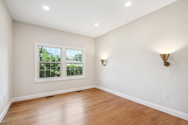 7 Eton Pl, Plainview, NY 11803 - unfurnished room with light wood-type flooring, baseboards, and recessed lighting