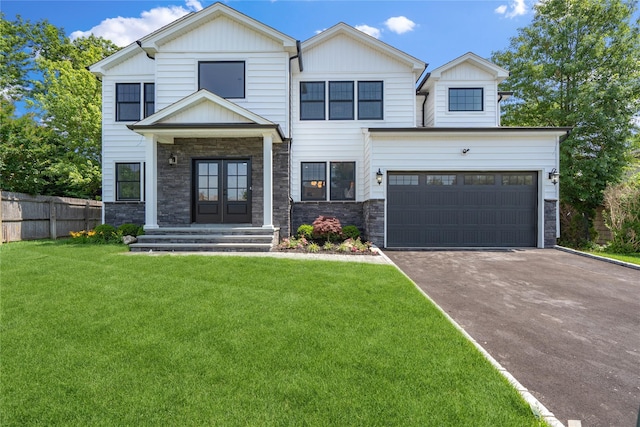 7 Eton Pl, Plainview, NY 11803 - view of front of house featuring stone siding, driveway, an attached garage, french doors, and board and batten siding