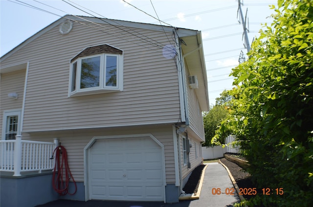 294 Fir Grove Rd, Ronkonkoma, NY 11779 - view of home's exterior featuring an attached garage