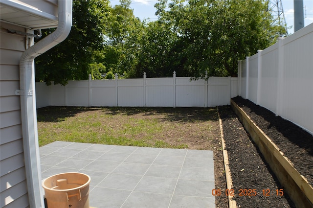 294 Fir Grove Rd, Ronkonkoma, NY 11779 - fenced backyard featuring a patio