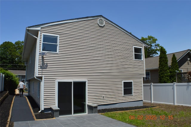 294 Fir Grove Rd, Ronkonkoma, NY 11779 - rear view of property with a patio