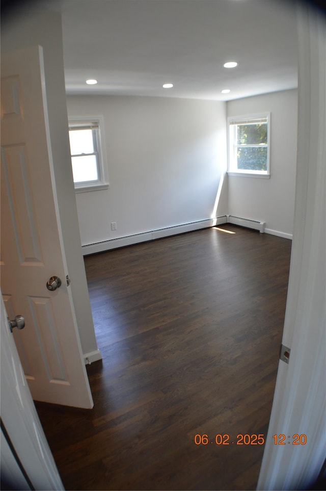 294 Fir Grove Rd, Ronkonkoma, NY 11779 - empty room with healthy amount of natural light, dark wood finished floors, recessed lighting, and baseboards