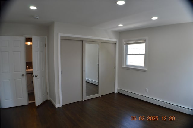 294 Fir Grove Rd, Ronkonkoma, NY 11779 - unfurnished bedroom with a baseboard radiator, recessed lighting, a closet, and dark wood finished floors