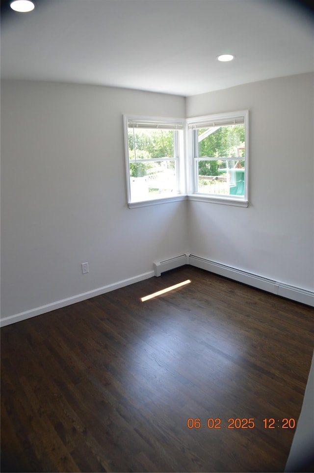 294 Fir Grove Rd, Ronkonkoma, NY 11779 - spare room featuring recessed lighting, dark wood-style floors, and baseboards