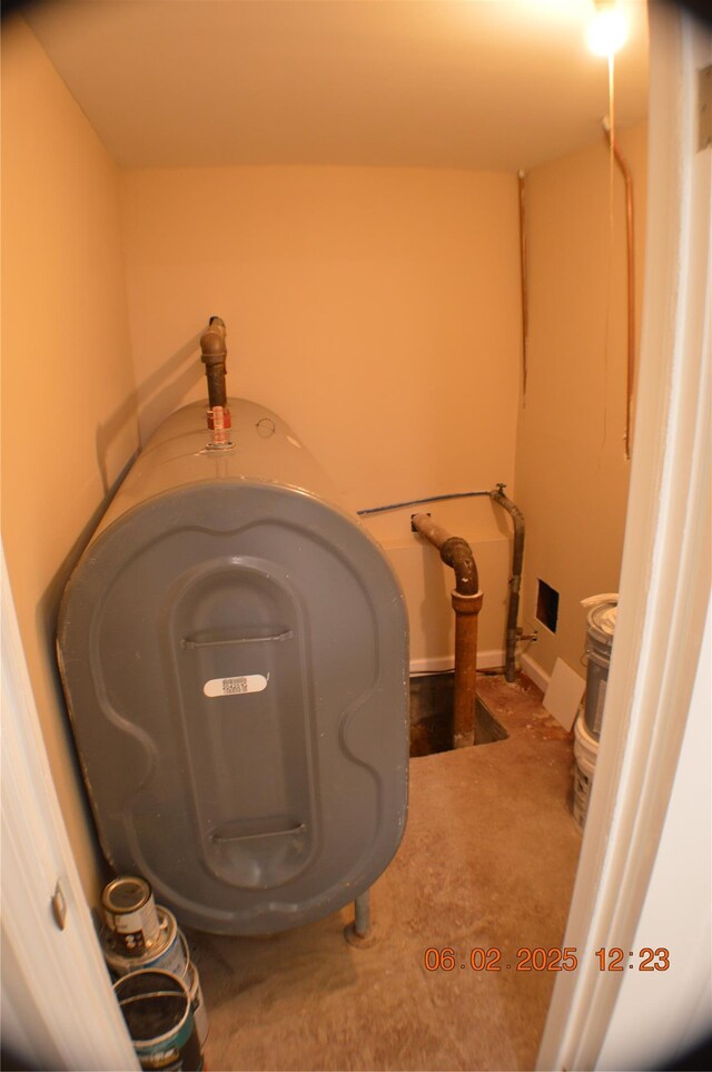 294 Fir Grove Rd, Ronkonkoma, NY 11779 - washroom with heating fuel and baseboards