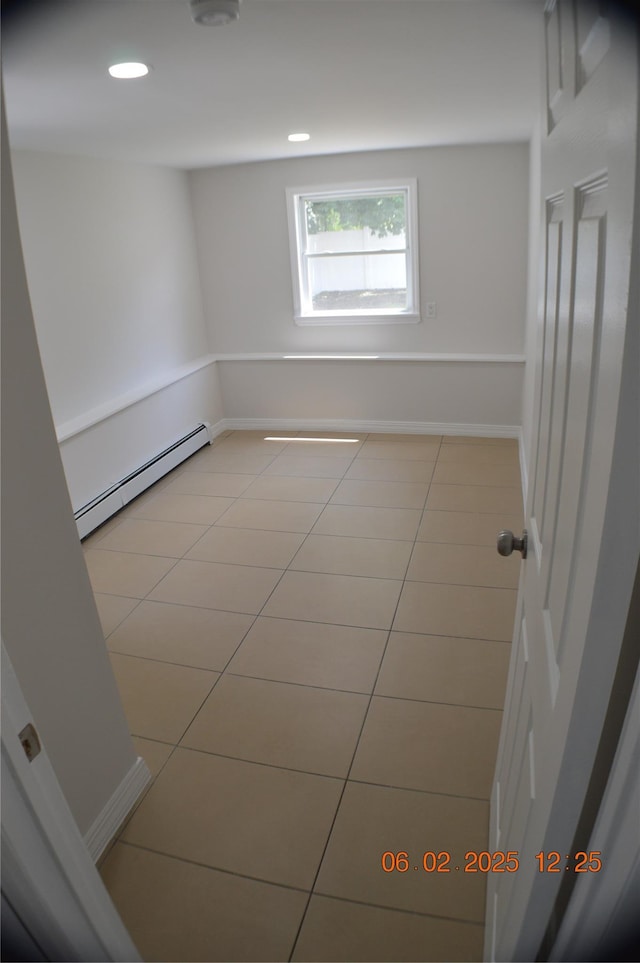 294 Fir Grove Rd, Ronkonkoma, NY 11779 - empty room featuring baseboard heating, light tile patterned floors, recessed lighting, and baseboards
