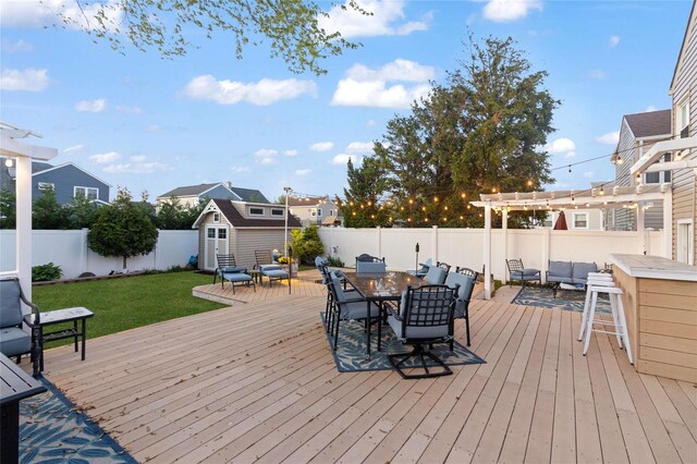 22 Martha St, Freeport, NY 11520 - deck with outdoor dining area, an outdoor living space, and a residential view