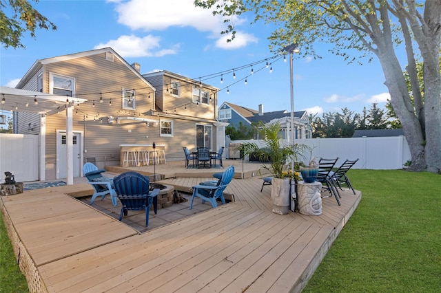 22 Martha St, Freeport, NY 11520 - wooden terrace featuring outdoor dining space and an outdoor fire pit