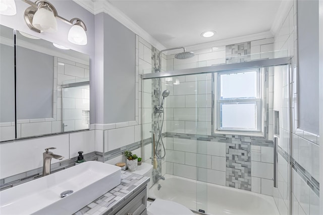 22 Martha St, Freeport, NY 11520 - bathroom featuring crown molding, enclosed tub / shower combo, vanity, toilet, and recessed lighting