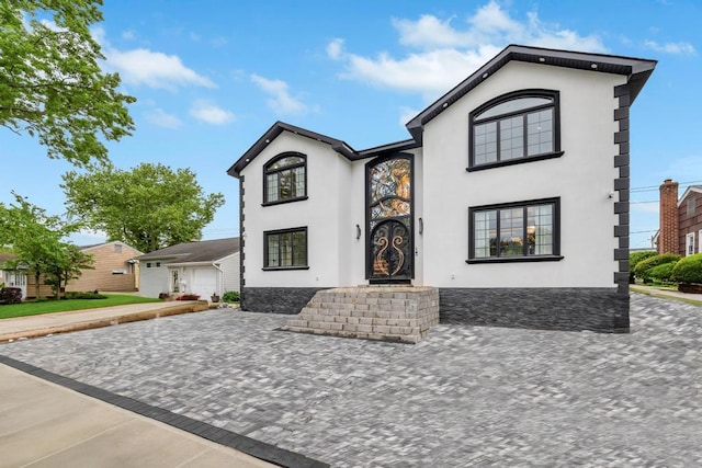 22 Elderberry Ln, Valley Stream, NY 11581 - french country home with stucco siding