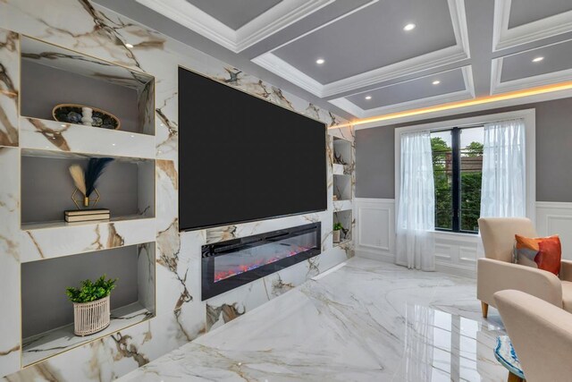 22 Elderberry Ln, Valley Stream, NY 11581 - bedroom with ornamental molding, a decorative wall, a wainscoted wall, a fireplace, and marble tiled floors