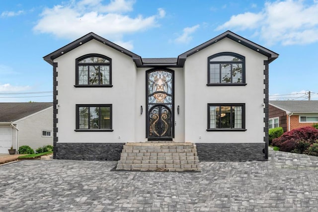 22 Elderberry Ln, Valley Stream, NY 11581 - french country style house featuring stucco siding