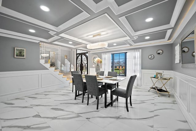 22 Elderberry Ln, Valley Stream, NY 11581 - dining room with a decorative wall, wainscoting, coffered ceiling, light marble finish floors, and stairs