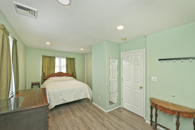 29 Andrew Ln, Levittown, NY 11756 - bedroom featuring wood finished floors, baseboards, and recessed lighting