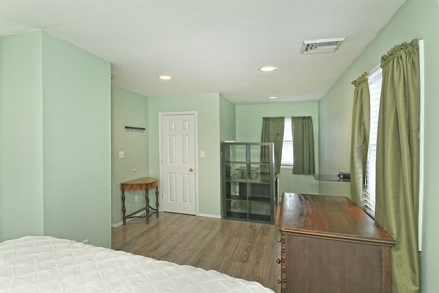 29 Andrew Ln, Levittown, NY 11756 - bedroom with wood finished floors, recessed lighting, and baseboards