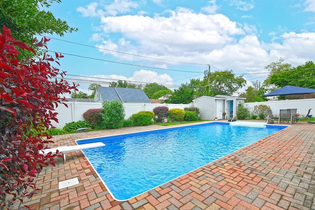 29 Andrew Ln, Levittown, NY 11756 - view of pool featuring a fenced backyard, a patio, and a diving board