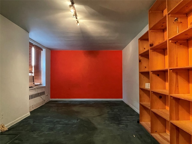 1480 Thieriot Ave Unit 6O, Bronx, NY 10460 - unfurnished room featuring radiator heating unit, track lighting, and carpet
