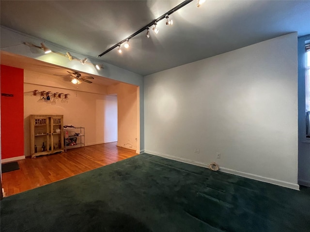 1480 Thieriot Ave Unit 6O, Bronx, NY 10460 - spare room featuring rail lighting, ceiling fan, carpet flooring, and wood finished floors