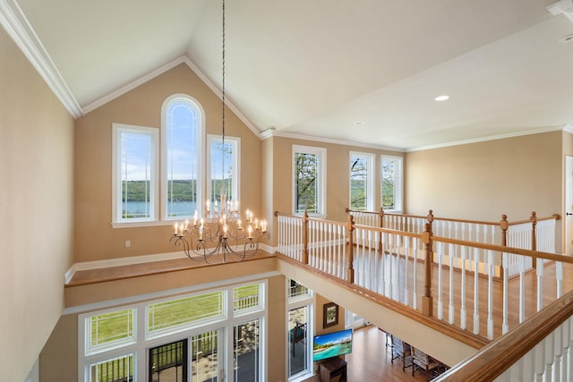 436 Steuben St, Call Listing Agent, NY 14891 - hallway with a chandelier, wood finished floors, lofted ceiling, and crown molding