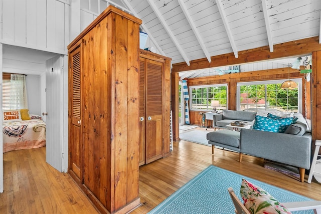 3300 Baker St Unit 20, Mohegan Lake, NY 10547 - hall with light wood-style flooring, wood walls, and plenty of natural light