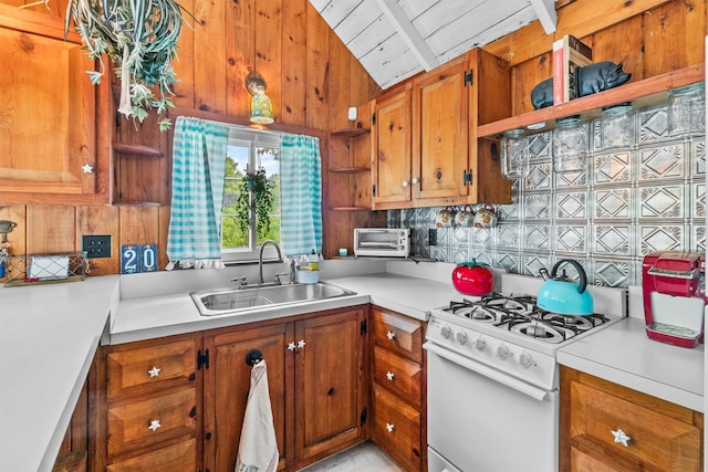3300 Baker St Unit 20, Mohegan Lake, NY 10547 - kitchen featuring open shelves, white range with gas cooktop, a sink, brown cabinets, and light countertops