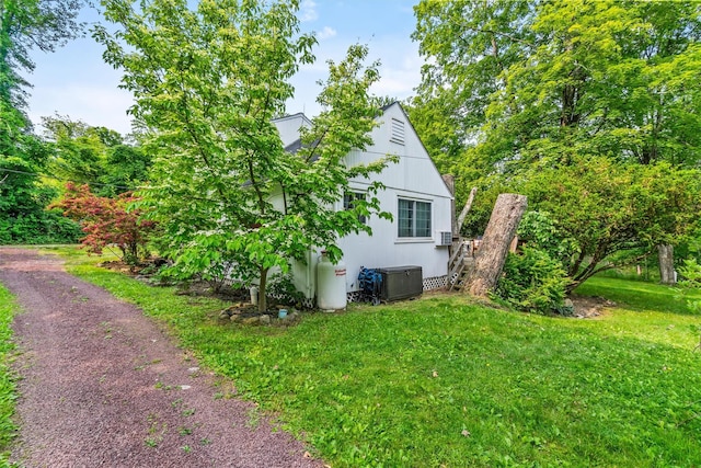 3300 Baker St Unit 20, Mohegan Lake, NY 10547 - view of property exterior featuring central AC and a yard