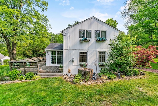 3300 Baker St Unit 20, Mohegan Lake, NY 10547 - back of property with a deck and a lawn