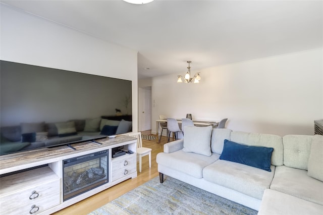 221 Middle Neck Rd Unit M-4, Great Neck, NY 11021 - living room featuring a chandelier and wood finished floors