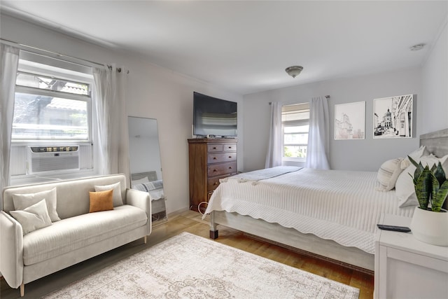 221 Middle Neck Rd Unit M-4, Great Neck, NY 11021 - bedroom with cooling unit and wood finished floors