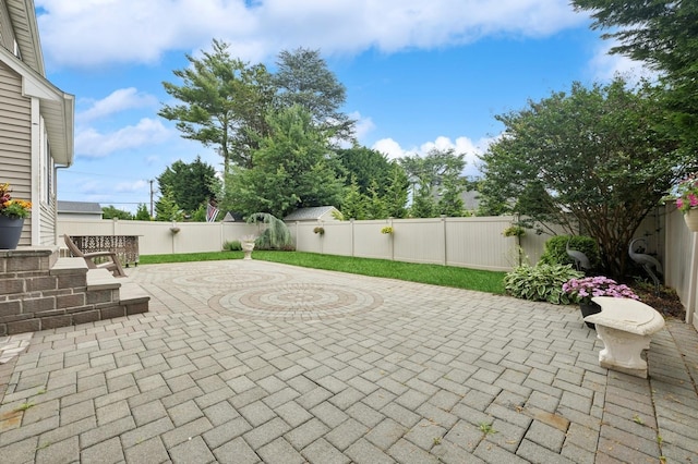 287 Atlantic Ave, Massapequa Park, NY 11762 - fenced backyard with a patio area