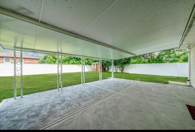 1 Leeward Ln, Commack, NY 11725 - fenced backyard featuring a storage unit and a patio area