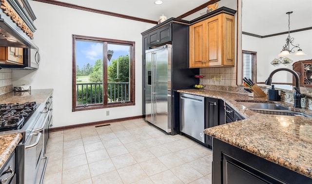 204 Moore Rd, Germantown, NY 12526 - kitchen with stainless steel appliances, a sink, crown molding, light stone counters, and backsplash
