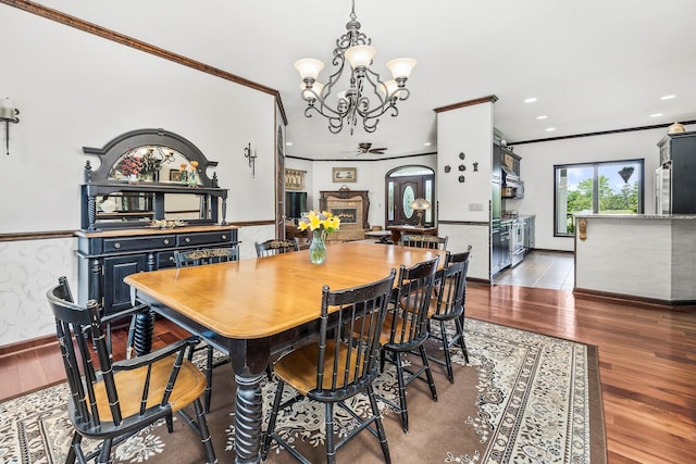 204 Moore Rd, Germantown, NY 12526 - dining area featuring a chandelier, crown molding, wood finished floors, recessed lighting, and baseboards